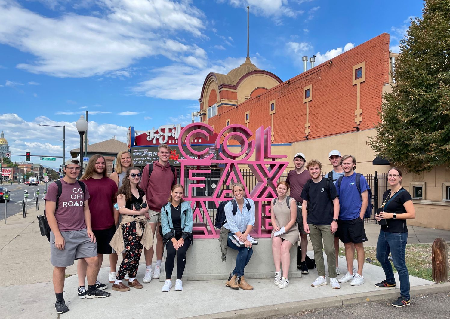 Kansas State University standing on Colfax Avenue in Denver, Colorado