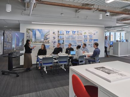 Meeting being conducted in a design firm